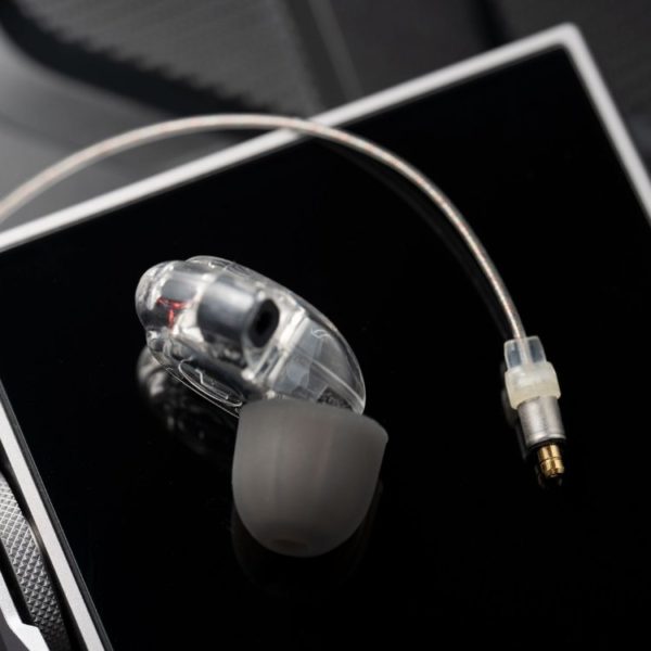 A close-up photo of a single Westone Audio Pro-X50 in-ear monitor (IEM) with a detached cable.